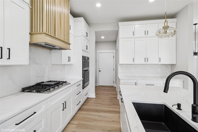 17400 Springbrook Trl, Urbandale, IA 50111 - kitchen with a sink, custom exhaust hood, appliances with stainless steel finishes, recessed lighting, and backsplash