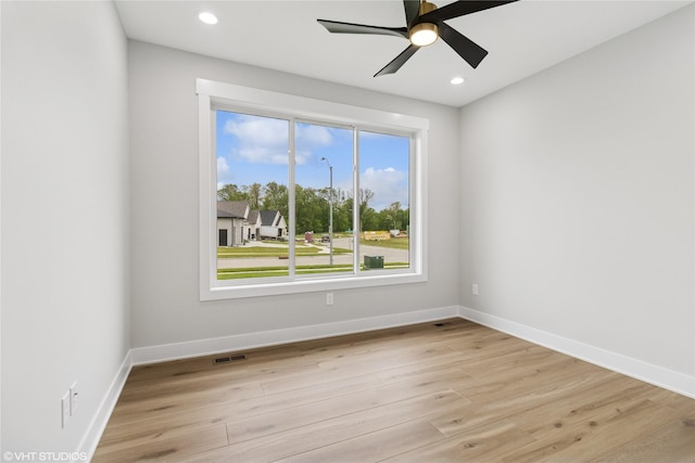 17400 Springbrook Trl, Urbandale, IA 50111 - empty room featuring light wood-style flooring, ceiling fan, recessed lighting, and baseboards