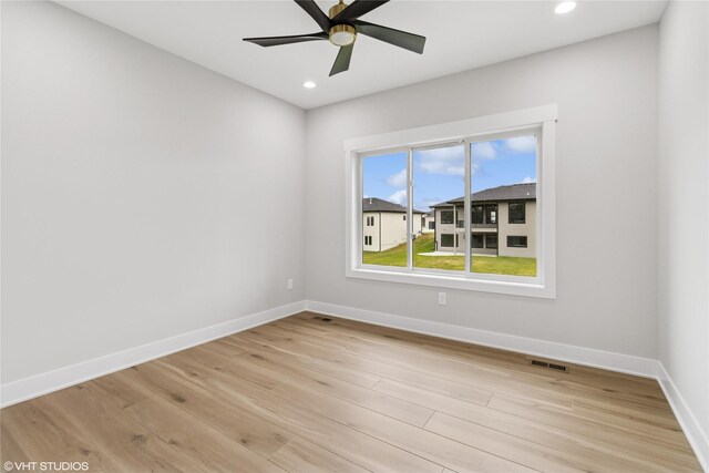 17400 Springbrook Trl, Urbandale, IA 50111 - empty room featuring baseboards, light wood-style flooring, recessed lighting, and ceiling fan