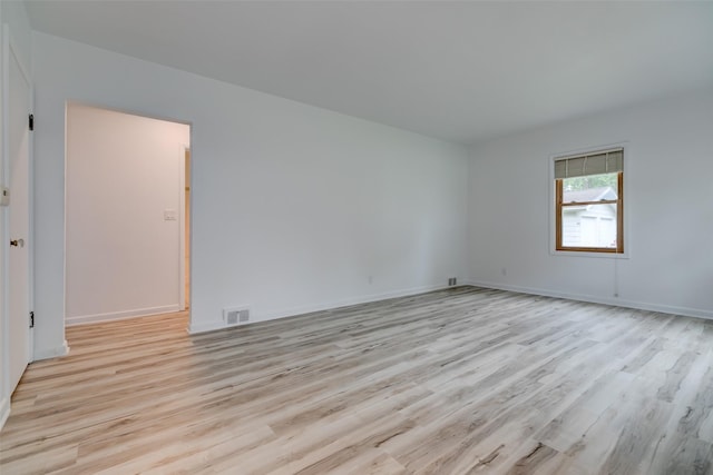 4007 68th St, Urbandale, IA 50322 - unfurnished room featuring light wood finished floors and baseboards