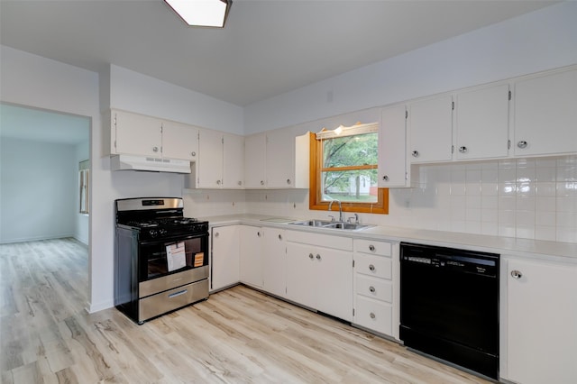 4007 68th St, Urbandale, IA 50322 - kitchen with dishwasher, gas stove, a sink, under cabinet range hood, and light wood-type flooring