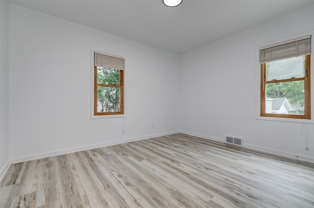 4007 68th St, Urbandale, IA 50322 - unfurnished room with light wood-style floors and baseboards