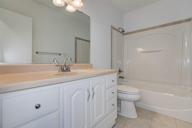 4007 68th St, Urbandale, IA 50322 - bathroom with tile patterned flooring, vanity, washtub / shower combination, and toilet