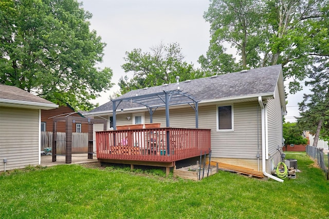 1236 63rd St, Windsor Heights, IA 50324 - rear view of property with a wooden deck, a pergola, a shingled roof, and cooling unit