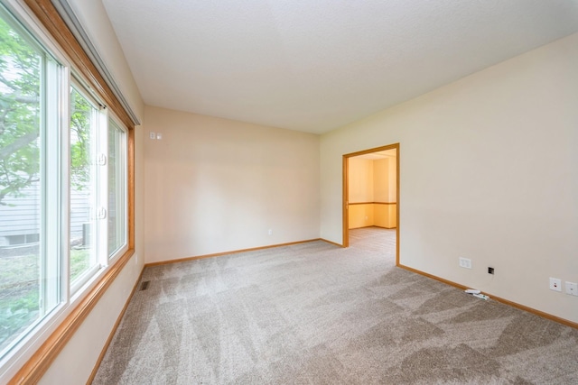 2230 NW 138th St, Clive, IA 50325 - unfurnished room with light carpet and baseboards