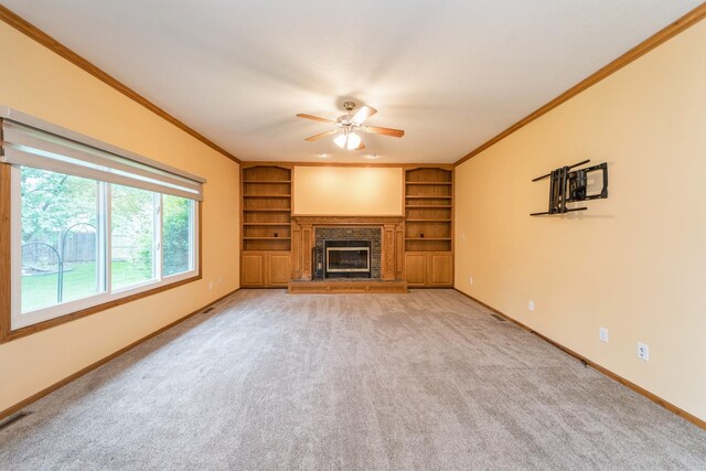 2230 NW 138th St, Clive, IA 50325 - unfurnished living room with ceiling fan, ornamental molding, a brick fireplace, baseboards, and built in features