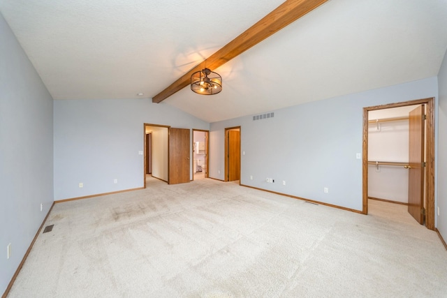 2230 NW 138th St, Clive, IA 50325 - unfurnished bedroom featuring a spacious closet, light colored carpet, baseboards, and a closet