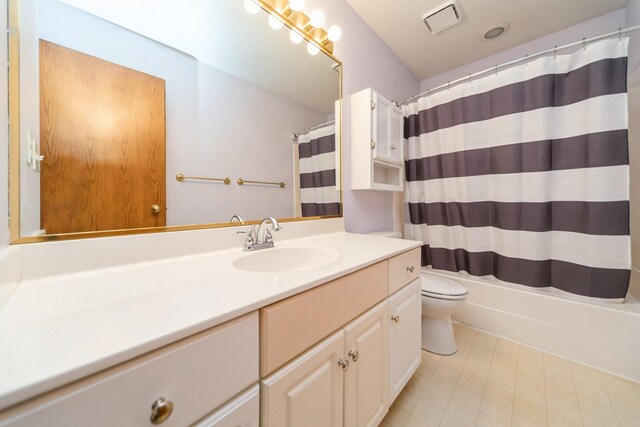 2230 NW 138th St, Clive, IA 50325 - full bath featuring vanity, toilet, tile patterned floors, and shower / bath combo with shower curtain