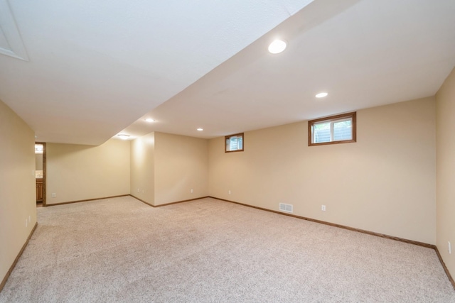 2230 NW 138th St, Clive, IA 50325 - below grade area featuring carpet, recessed lighting, and baseboards