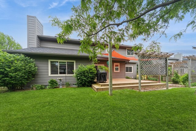 2230 NW 138th St, Clive, IA 50325 - rear view of house featuring a pergola, a deck, a chimney, and a yard