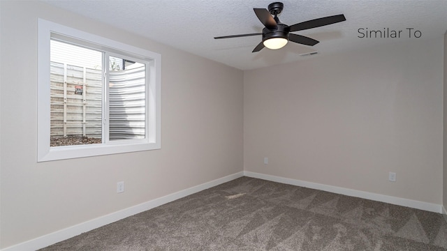610 NW Georgetown Dr, Waukee, IA 50263 - unfurnished room with dark colored carpet, a textured ceiling, baseboards, and ceiling fan