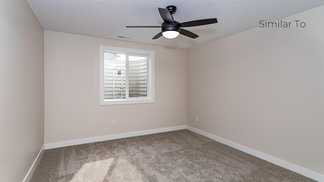 610 NW Georgetown Dr, Waukee, IA 50263 - spare room with carpet, a textured ceiling, ceiling fan, and baseboards