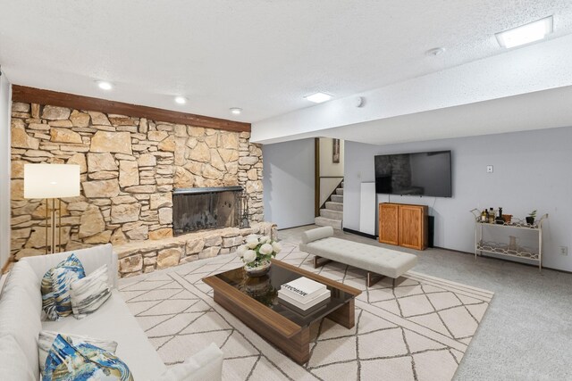 4633 Lockner Dr Unit 3, Urbandale, IA 50322 - living room with a fireplace, stairs, and light colored carpet