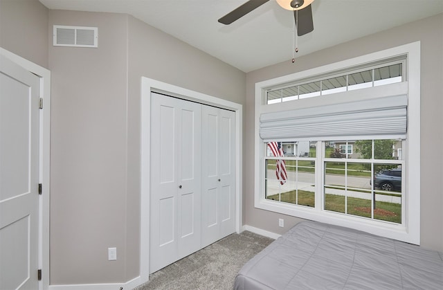 1917 Southbridge Dr, Adel, IA 50003 - carpeted bedroom with a closet and a ceiling fan