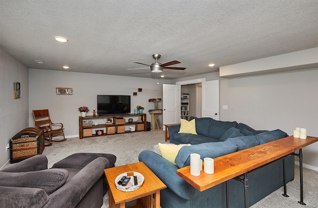 1917 Southbridge Dr, Adel, IA 50003 - living room featuring carpet, a ceiling fan, baseboards, recessed lighting, and a textured ceiling