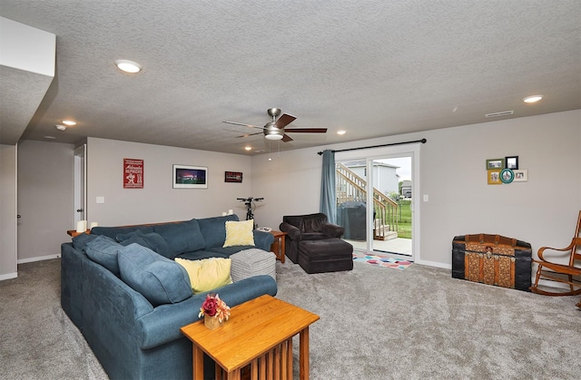 1917 Southbridge Dr, Adel, IA 50003 - carpeted living room featuring a textured ceiling, recessed lighting, ceiling fan, and baseboards