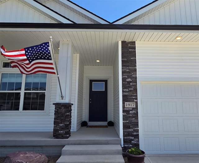 1917 Southbridge Dr, Adel, IA 50003 - view of exterior entry featuring stone siding and covered porch