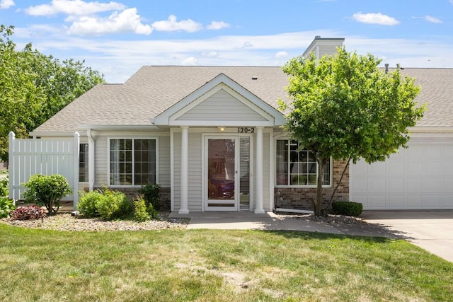 120 NW Georgetown Blvd Unit 2, Ankeny, IA 50023 - view of front of property with an attached garage, concrete driveway, a shingled roof, and brick siding