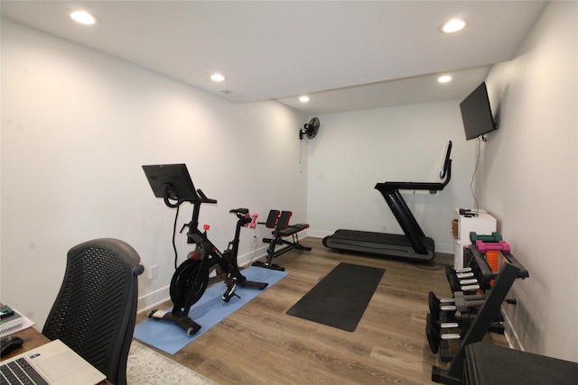 5015 153rd St, Urbandale, IA 50323 - exercise area featuring recessed lighting, wood finished floors, and baseboards