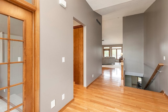 3605 151st St, Urbandale, IA 50323 - hall featuring wood finished floors and baseboards