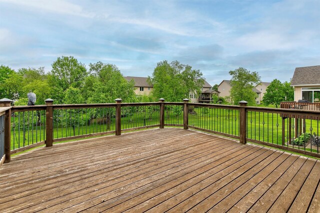 3605 151st St, Urbandale, IA 50323 - wooden terrace featuring a lawn and a residential view