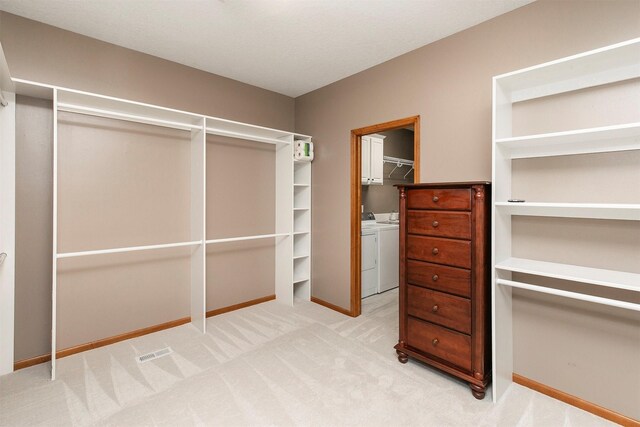 3605 151st St, Urbandale, IA 50323 - spacious closet with separate washer and dryer and light carpet