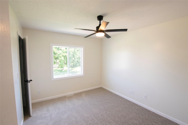 712 63rd St, West Des Moines, IA 50266 - carpeted empty room featuring ceiling fan and baseboards