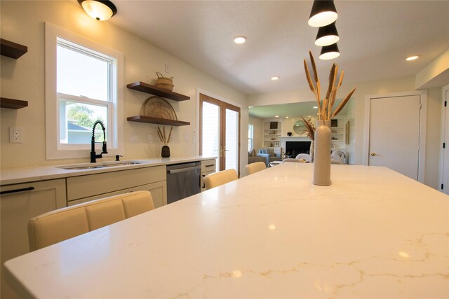 712 63rd St, West Des Moines, IA 50266 - kitchen with open shelves, dishwasher, a sink, white cabinets, and recessed lighting