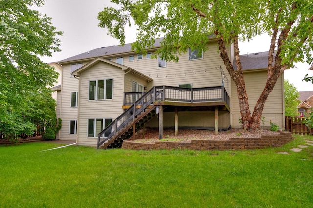 123 62nd St, West Des Moines, IA 50266 - back of property featuring stairs, a wooden deck, and a lawn