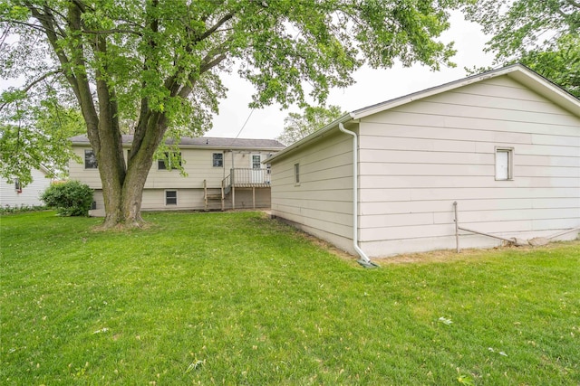 406 SE Trilein Dr, Ankeny, IA 50021 - rear view of house featuring a lawn