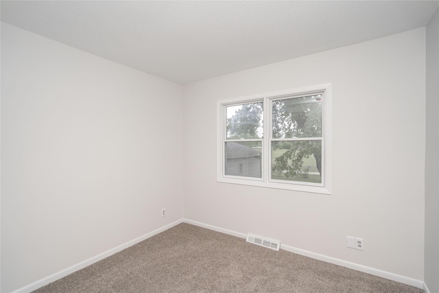 406 SE Trilein Dr, Ankeny, IA 50021 - spare room featuring carpet and baseboards