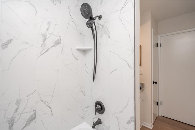 406 SE Trilein Dr, Ankeny, IA 50021 - bathroom featuring bathtub / shower combination and wood finished floors