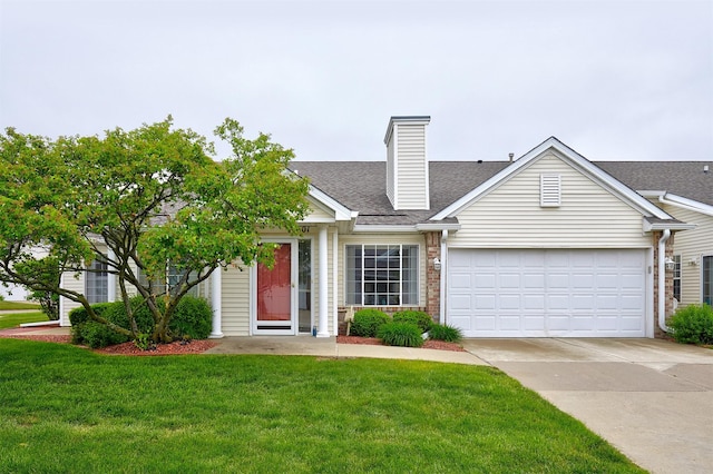 6200 Ep True Pkwy Unit 601, West Des Moines, IA 50266 - view of front facade with concrete driveway, a front yard, an attached garage, a chimney, and a shingled roof