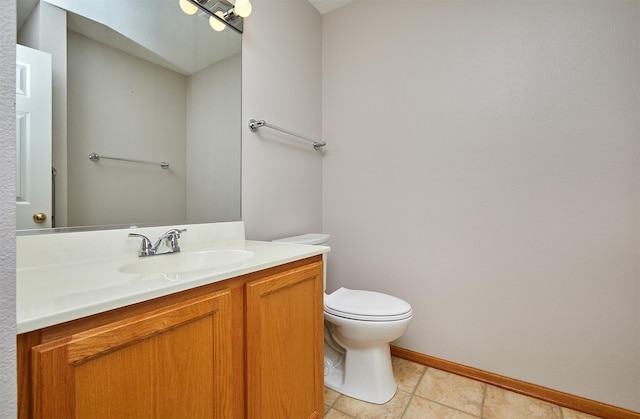 6200 Ep True Pkwy Unit 601, West Des Moines, IA 50266 - bathroom with toilet, vanity, and baseboards
