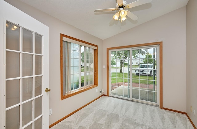 6200 Ep True Pkwy Unit 601, West Des Moines, IA 50266 - spare room with baseboards, lofted ceiling, carpet floors, and a ceiling fan
