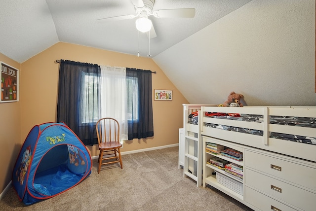 819 Olinda Ave, Des Moines, IA 50315 - bedroom with vaulted ceiling, light colored carpet, a ceiling fan, and baseboards