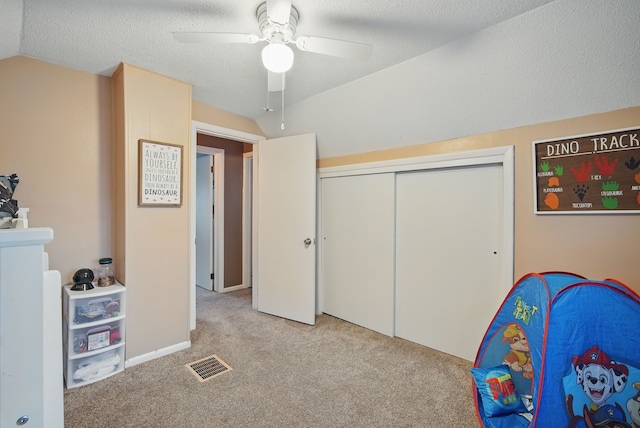 819 Olinda Ave, Des Moines, IA 50315 - game room featuring light colored carpet, a ceiling fan, and lofted ceiling