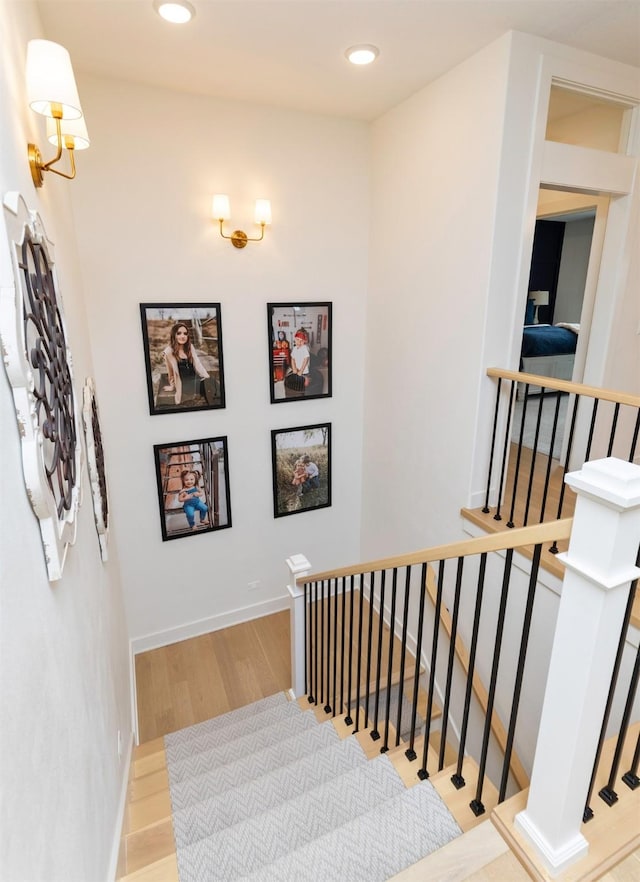 5018 NE Seneca Dr, Ankeny, IA 50021 - stairs featuring wood finished floors and recessed lighting