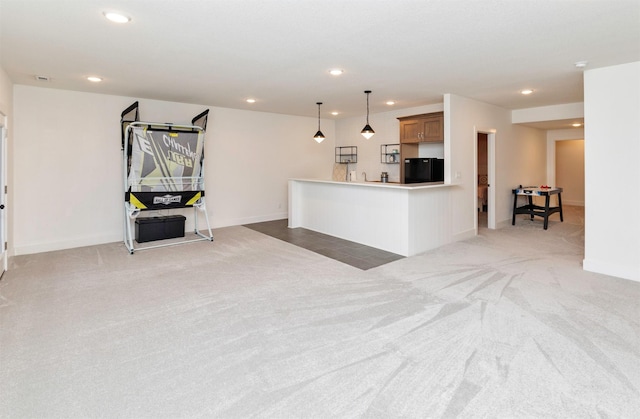 5018 NE Seneca Dr, Ankeny, IA 50021 - living room with light carpet, recessed lighting, and baseboards