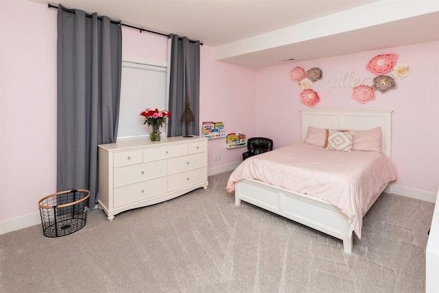 5018 NE Seneca Dr, Ankeny, IA 50021 - bedroom featuring light colored carpet and baseboards