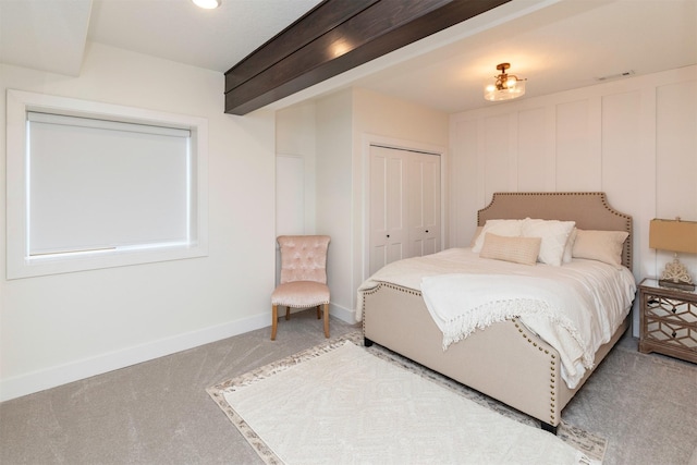 5018 NE Seneca Dr, Ankeny, IA 50021 - bedroom with carpet flooring, a closet, and baseboards