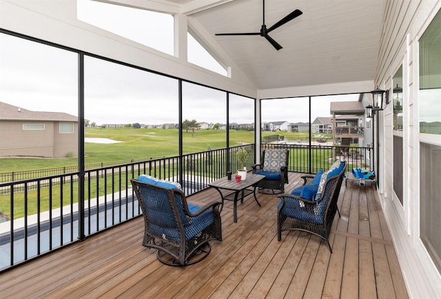 5018 NE Seneca Dr, Ankeny, IA 50021 - sunroom featuring a ceiling fan, view of golf course, vaulted ceiling, and an outdoor hangout area