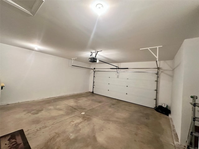 902 W Filmore St, Winterset, IA 50273 - garage with a garage door opener