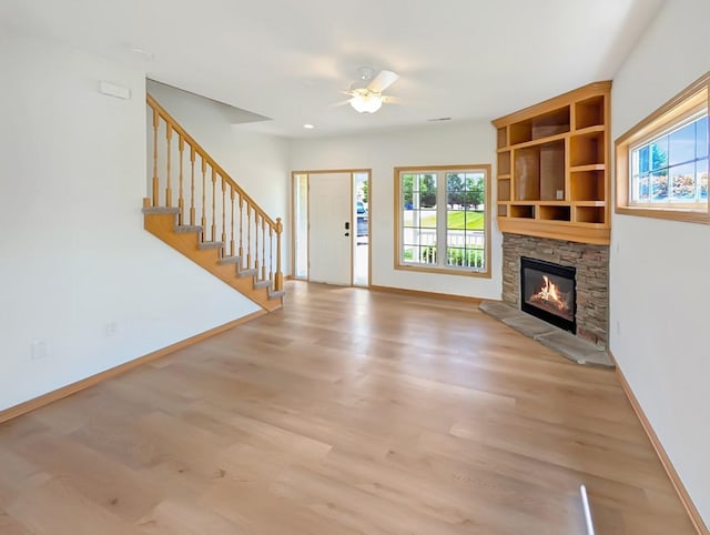 2101 Meadow Ct Unit 1304, Des Moines, IA 50320 - entrance foyer with plenty of natural light, a ceiling fan, wood finished floors, and recessed lighting