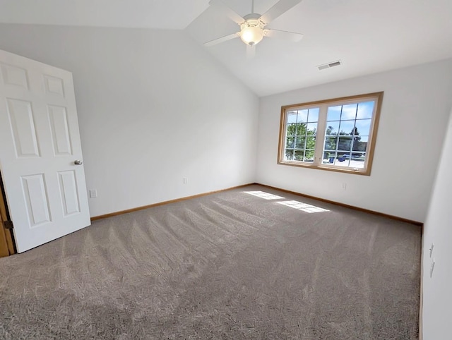 2101 Meadow Ct Unit 1304, Des Moines, IA 50320 - carpeted empty room featuring vaulted ceiling, baseboards, and a ceiling fan
