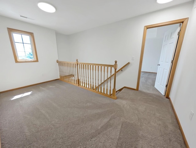 2101 Meadow Ct Unit 1304, Des Moines, IA 50320 - carpeted empty room featuring baseboards