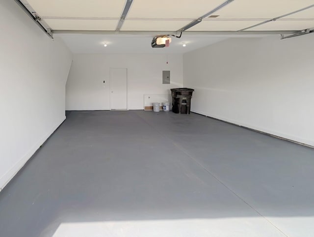 2101 Meadow Ct Unit 1304, Des Moines, IA 50320 - garage featuring a garage door opener and electric panel