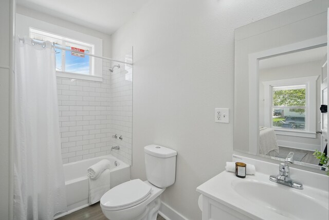 1519 Searle St, Des Moines, IA 50317 - full bath with healthy amount of natural light, shower / tub combo with curtain, and vanity