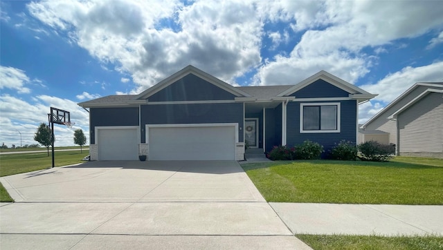1932 Strauss Ave, Adel, IA 50003 - ranch-style house with a garage, a front lawn, and concrete driveway