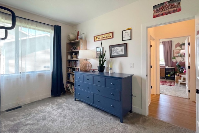 1932 Strauss Ave, Adel, IA 50003 - carpeted bedroom featuring baseboards